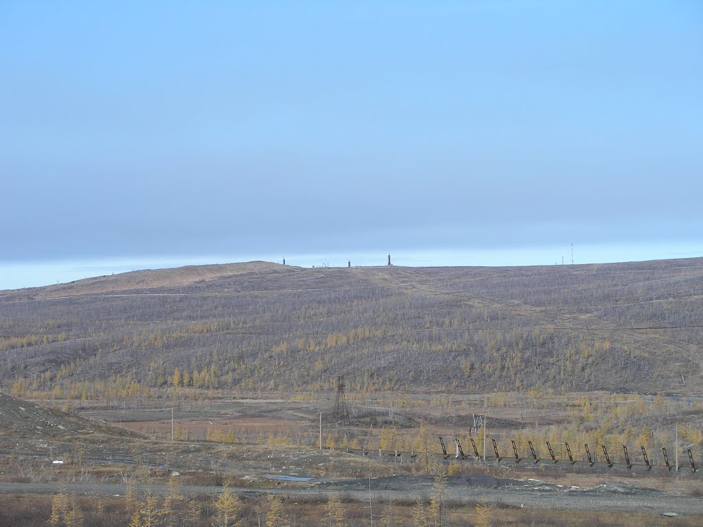 Vega MS with calibration masts, view from Norilsk-Dudinka highway, polar summer